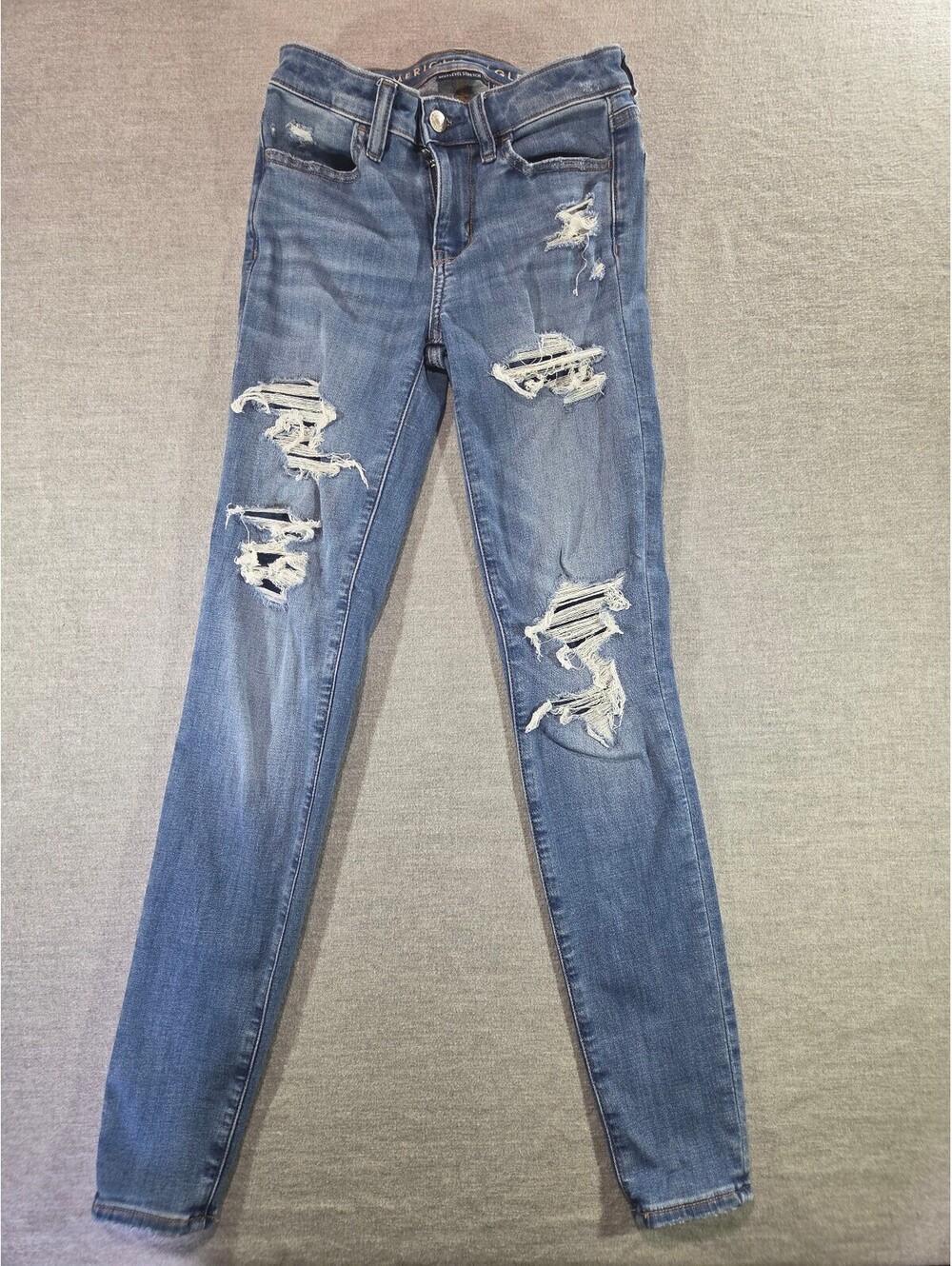 American Eagle jegging distressed blue jeans